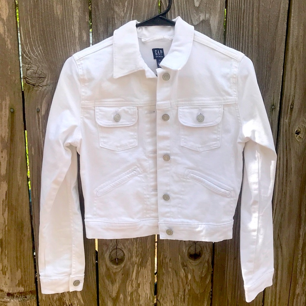 White GAP denim jacket. 21” long. New without tags, never worn.